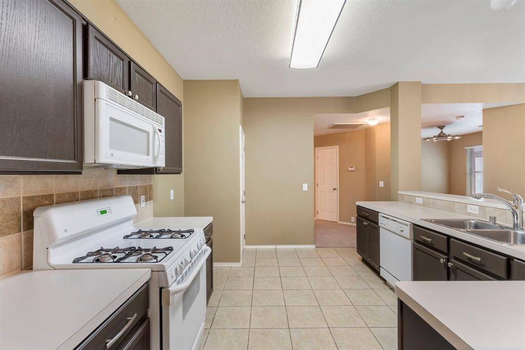 Modern kitchen with efficient gas appliances for optimal cooking and energy savings.