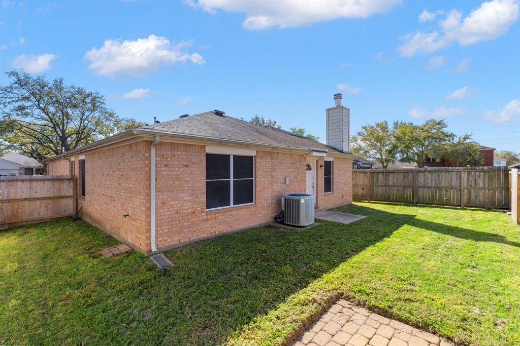 Expansive backyard perfect for relaxation and outdoor activities.