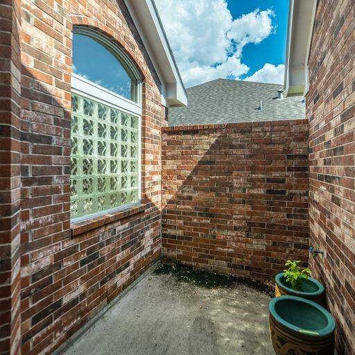 Brick enclosed patio Secondary bedrooms