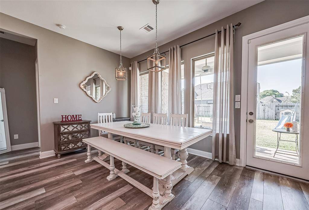 There is sppace for 8+ in this dining room.