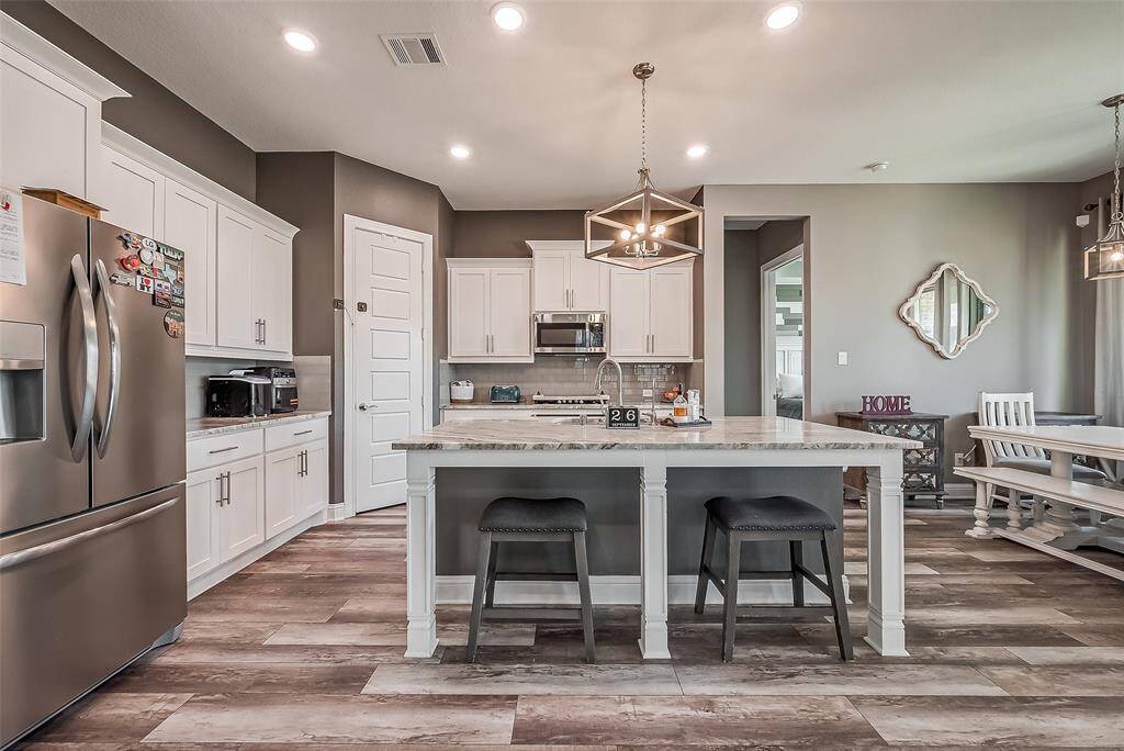 Sellers have upgraded to designer paint colors throughout the home.