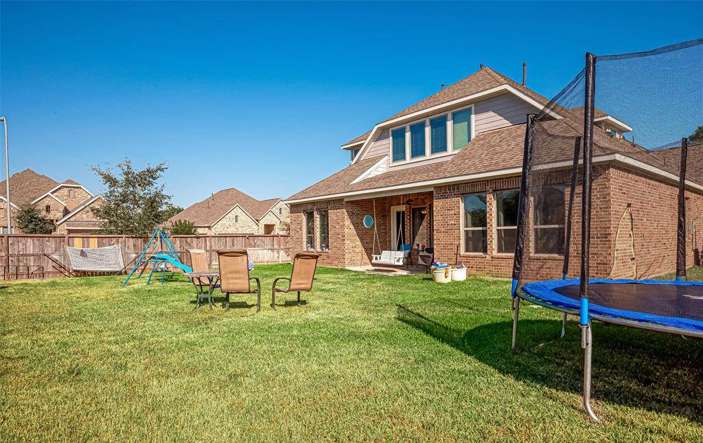 Step out onto the covered back porch and enjoy the almost constant breeze.
