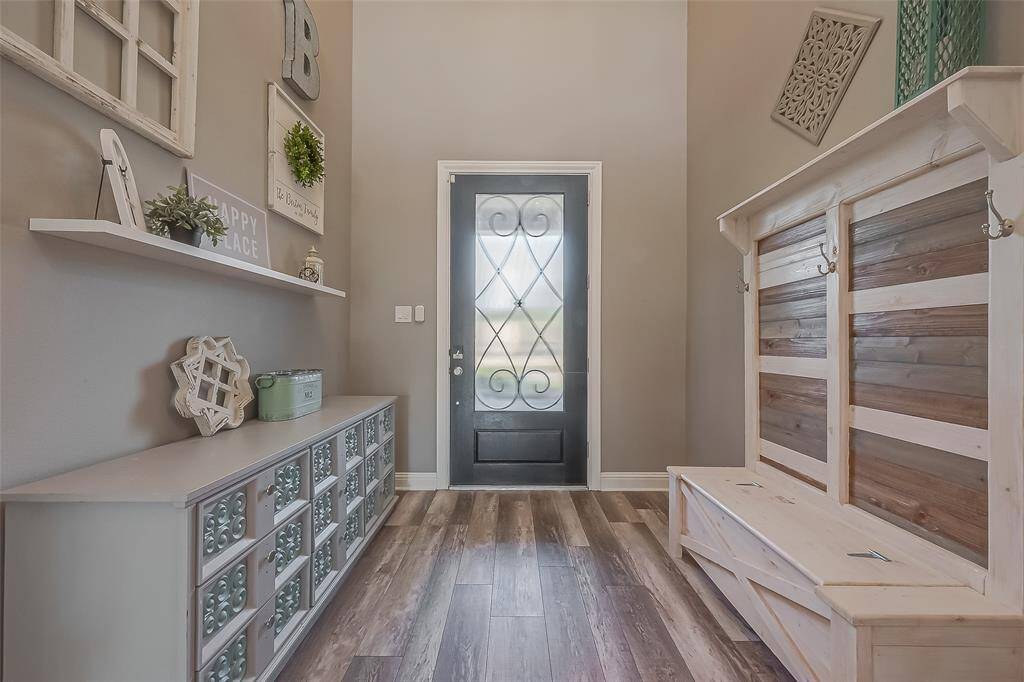 Even with large furniture, this light and bright foyer is spacious.
