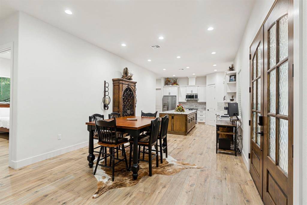 The dining area is right off the kitchen and leads to the living room.