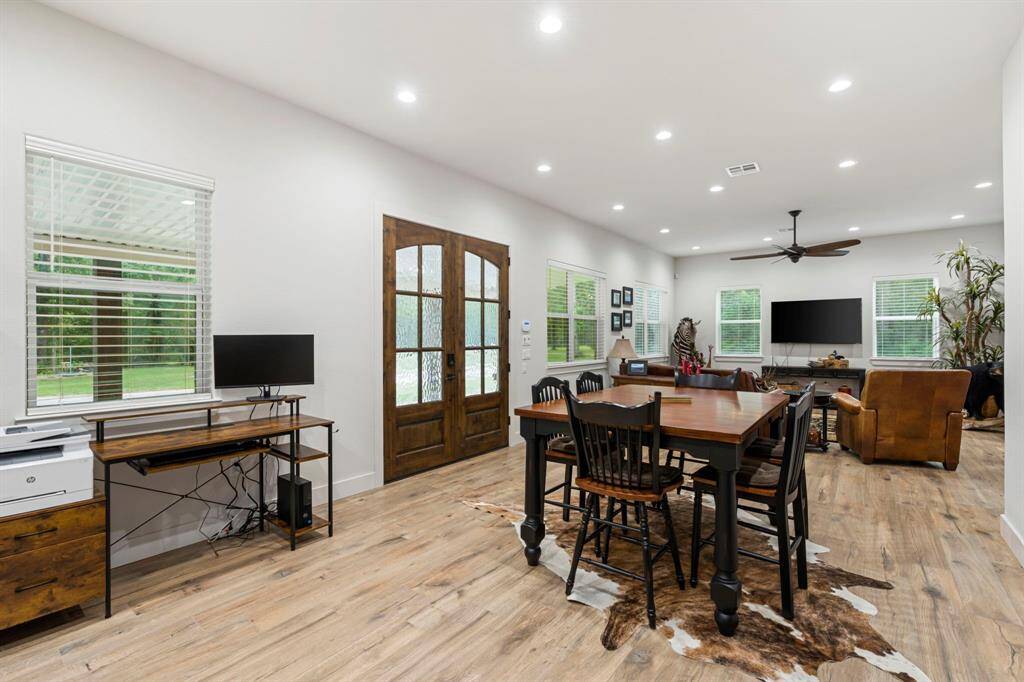 The dining area is right off the kitchen and leads to the living room.