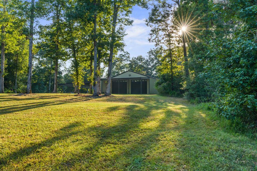 Tall trees provide plenty of shade throughout the property.