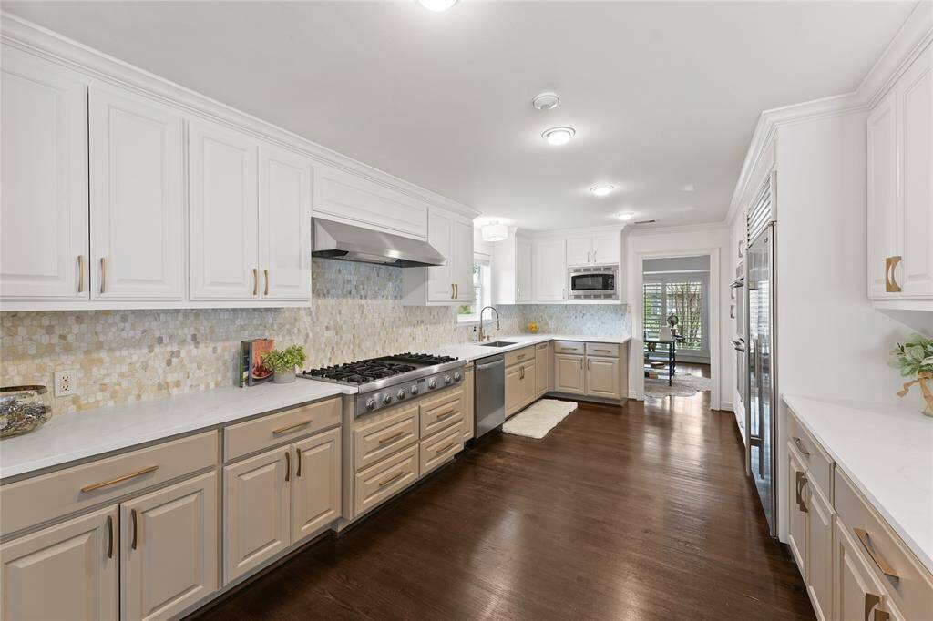 Family Room with Recessed Lighting and New Fixtures