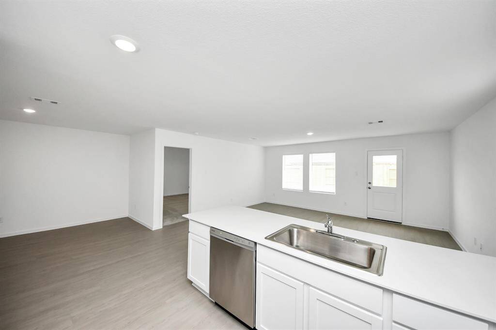 Whether you're cooking, dining, or relaxing, this thoughtfully designed layout keeps everyone connected.