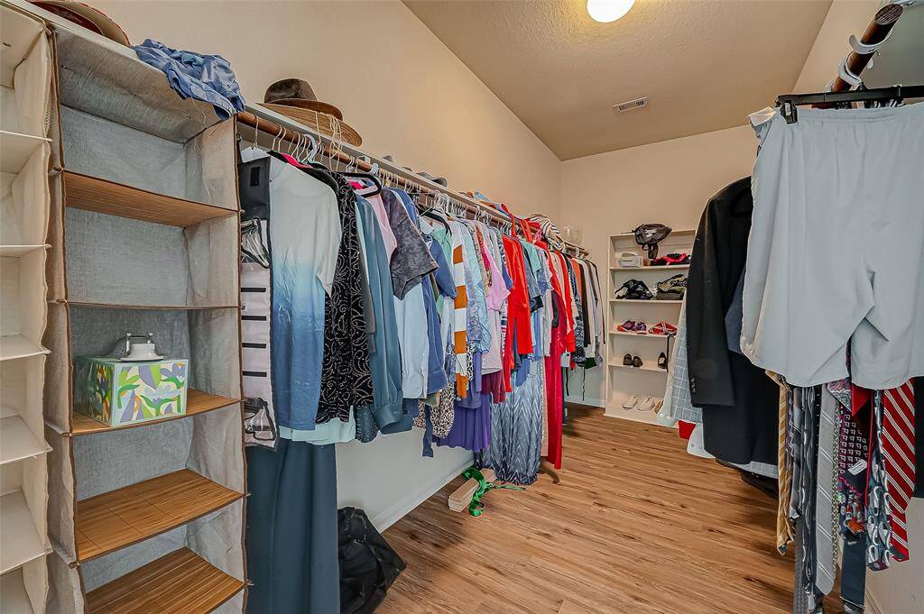 Primary Walk-in Close - Two Walk-in Closets
