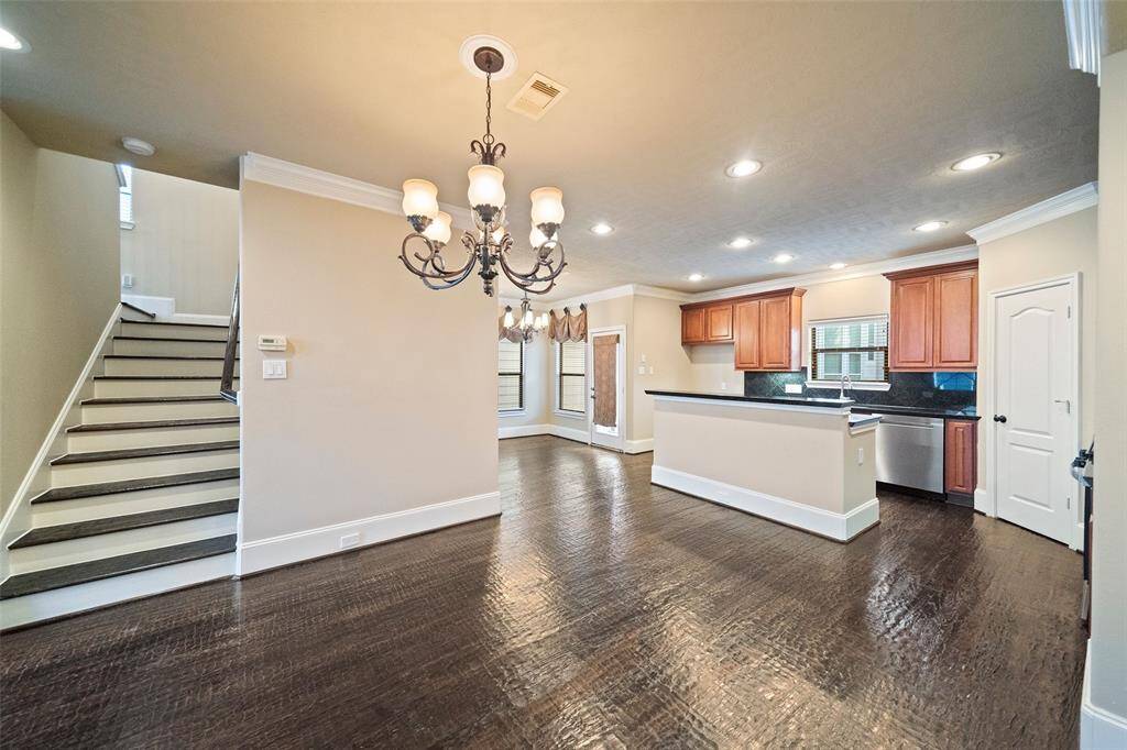 Seamlessly connected dining and kitchen space, perfect for entertaining and comfortable living.