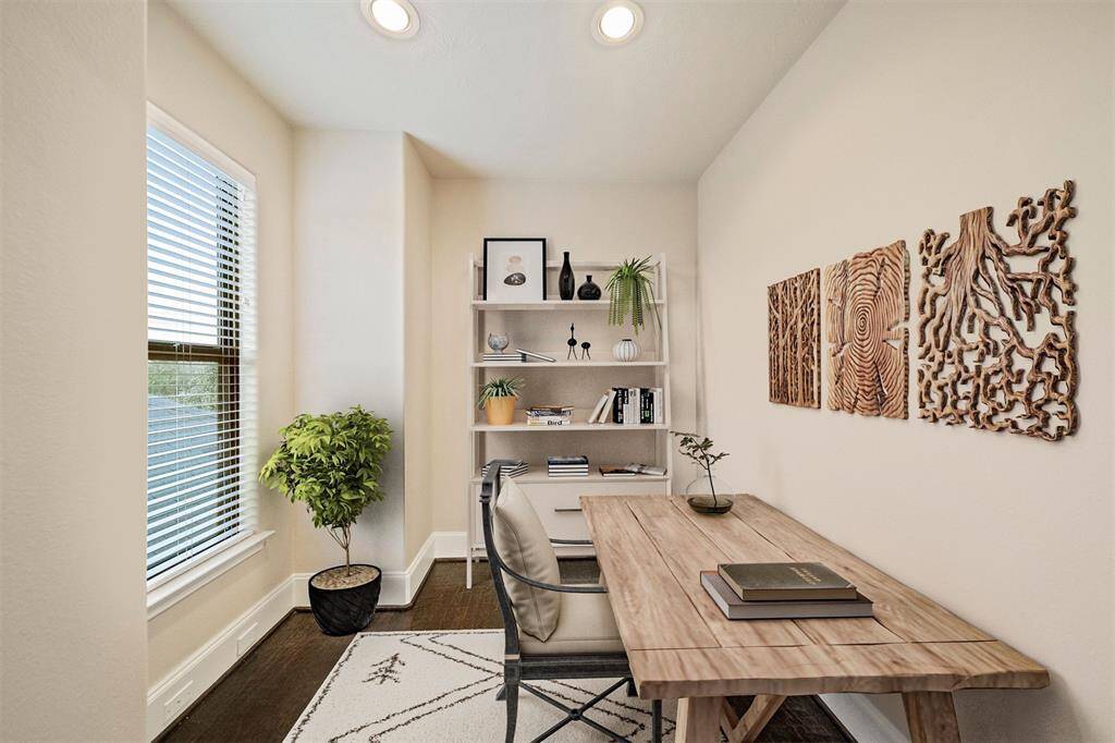 Seamless work-from-home oasis conveniently connected to the master suite, illustrated with virtual staging.