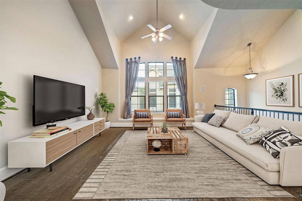 Experience the spacious elegance of this virtually staged living room, designed to inspire comfort and style.