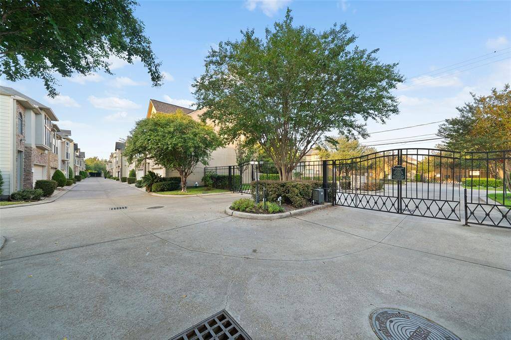 Welcome to exclusive Memorial Park Village, featuring secure gated access and ample parking for guests.  City ordinance forbids trains from utilizing their horns keeping the area quiet.