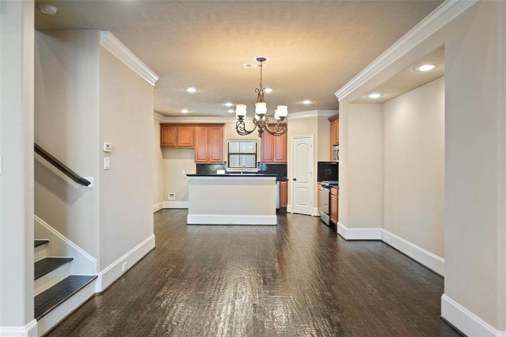 Explore the seamless flow into the inviting dining space, perfect for entertaining.