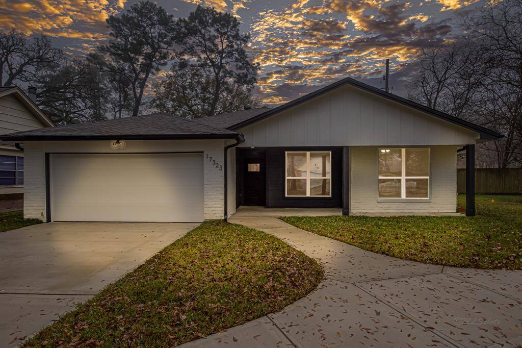 A freshly painted white exterior and brand-new driveway welcome you to this beautifully remodeled home.