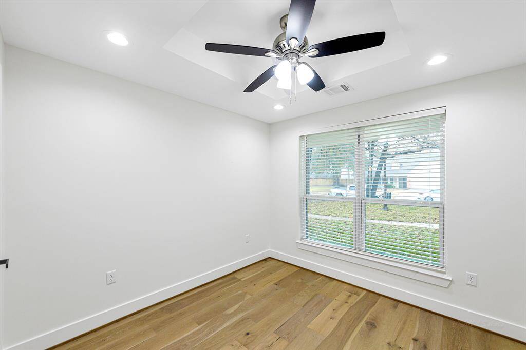 Spacious secondary bedrooms with updated finishes and generous closet space.