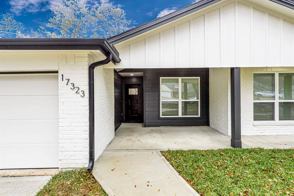 A thoughtfully designed entryway with charming curb appeal and modern finishes sets the tone for this stunning home.
