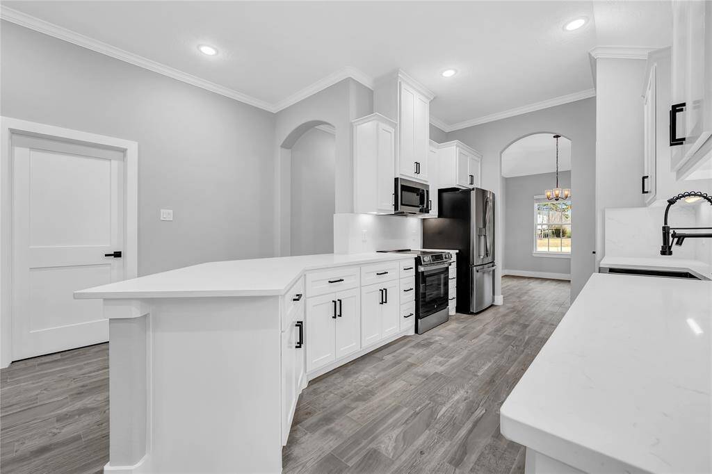 The door you see in this photo leads to the laundry room and garage.