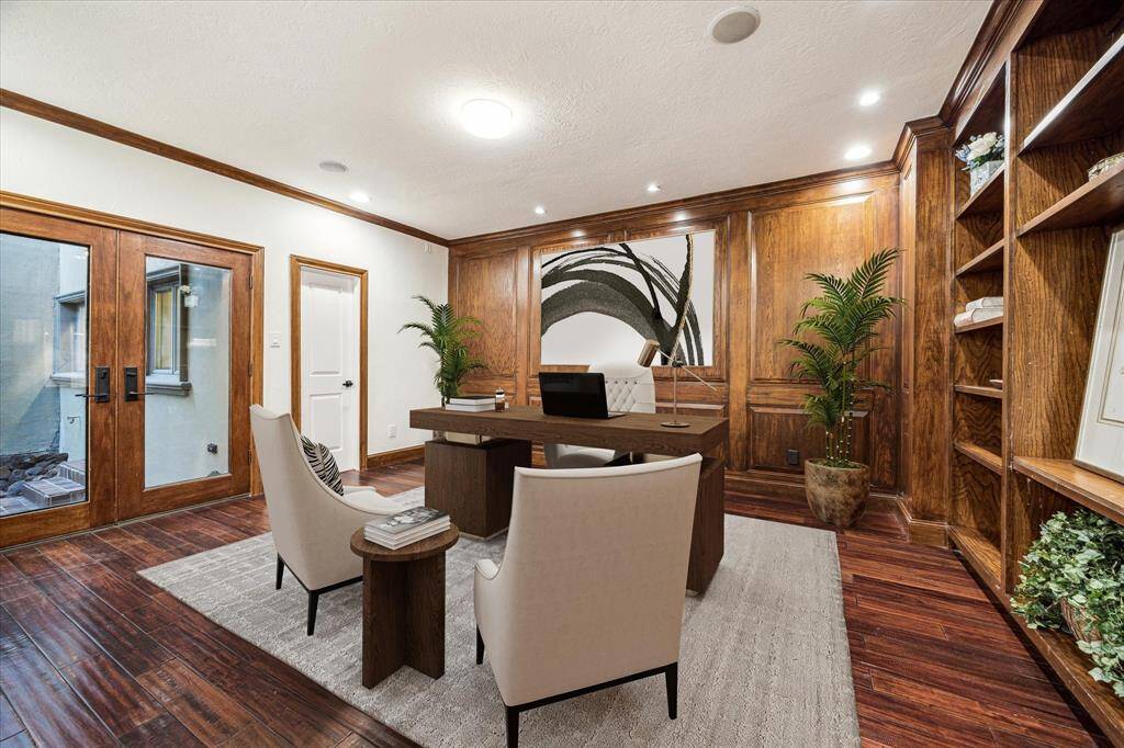 FIRST FLOOR GUEST SUITE/HOME OFFICE... Virtually staged as home office.