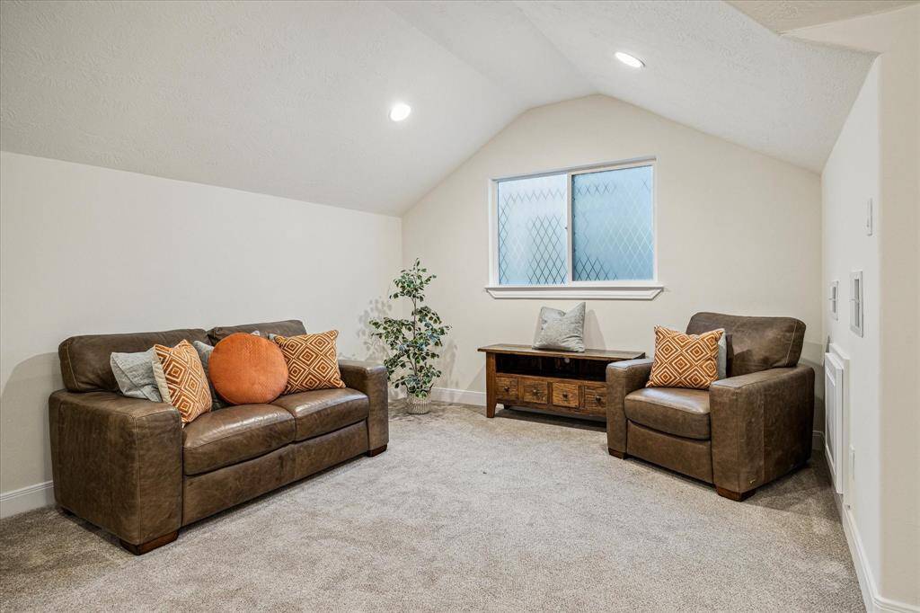 GAMEROOM… Neutral carpet, large window with privacy glass and oversized walk-in closet which enables this room to be a possible fifth bedroom. Or someone could watch a movie in the adjacent theatre room while others play in this potential gameroom.
