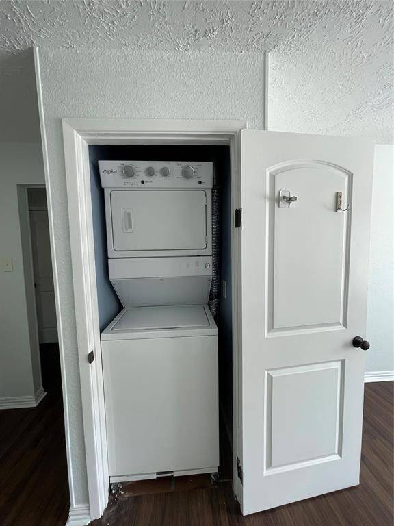 Stackable washer/dryer included.