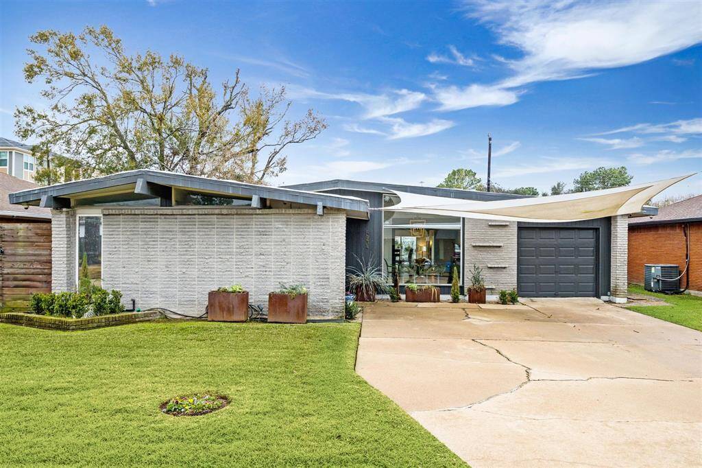This stunning 3 or 4 bedroom / 3.5 bath mid-century modern home is situated on an oversized lot and offers fabulous updates, amazing natural light, an in-ground “Cowboy Pool”, koi pond, storage shed, and so much more.