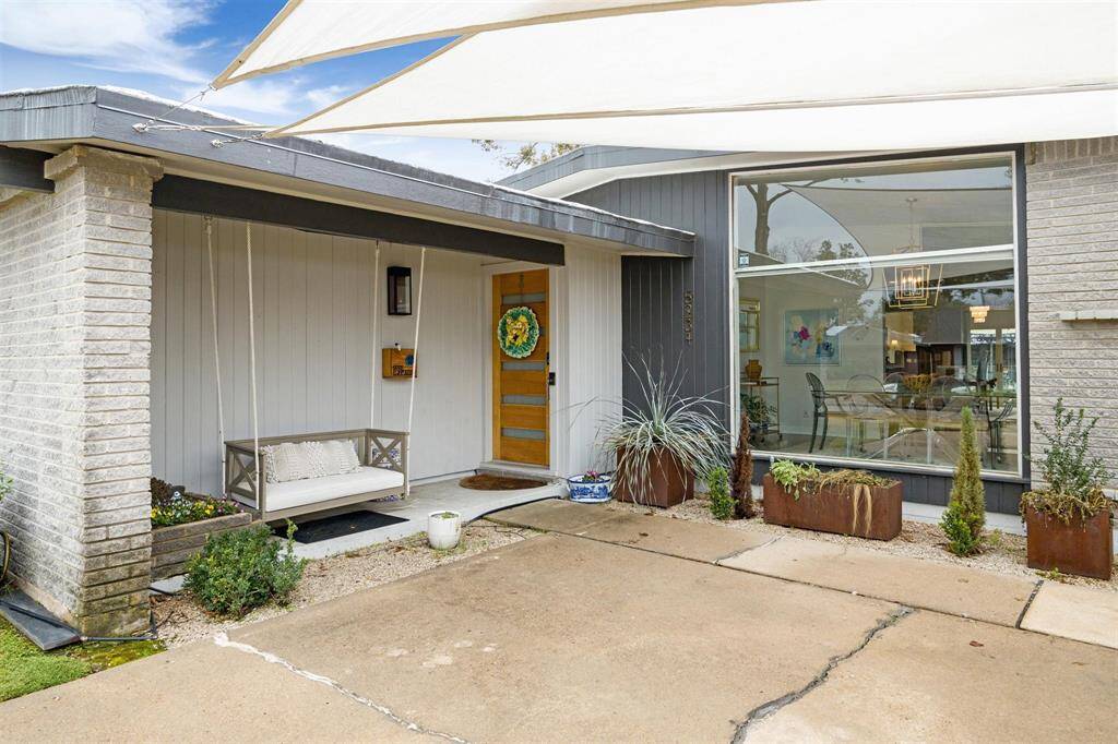 Enjoy the front porch swing on a beautiful Houston day!