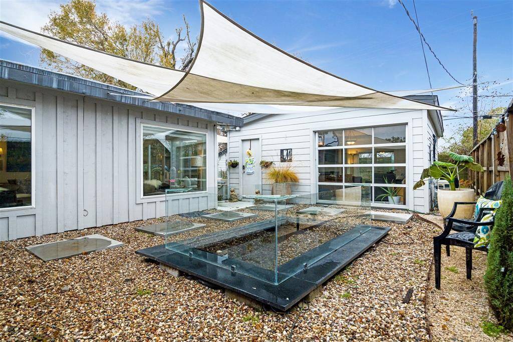 A Koi Pond is located in the backyard space.