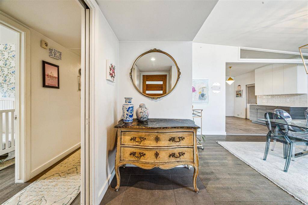 Hallway and dining room access from the entry.