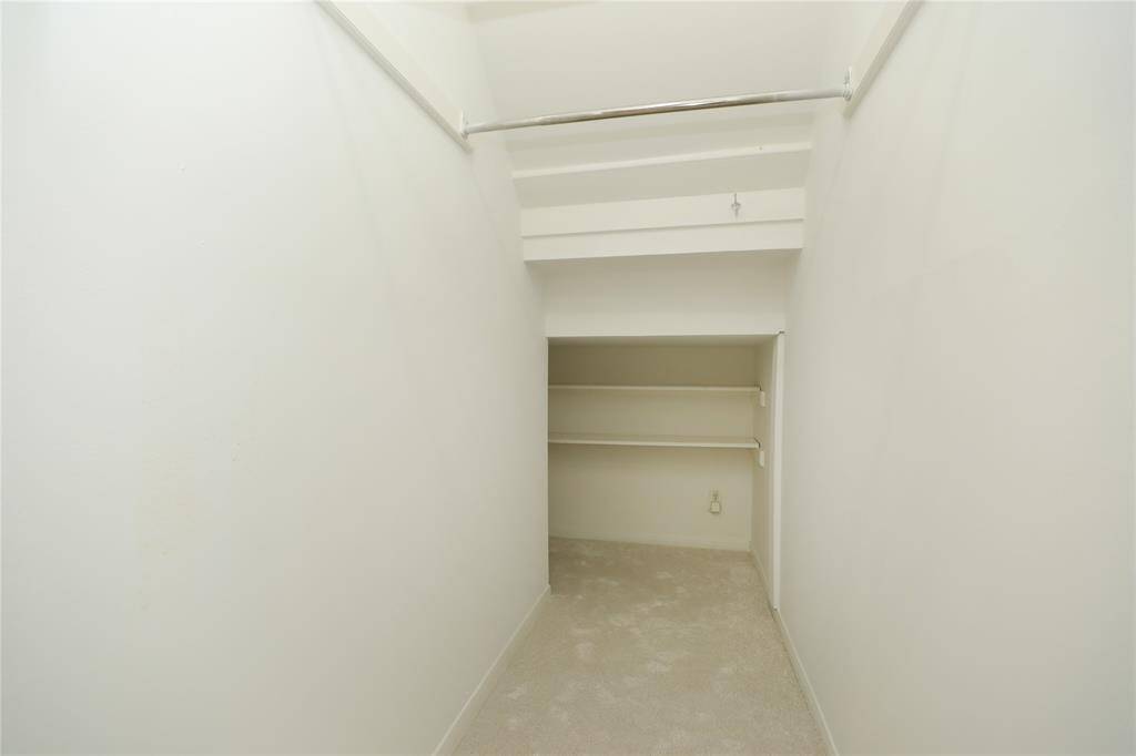 Coat closet with additional storage area