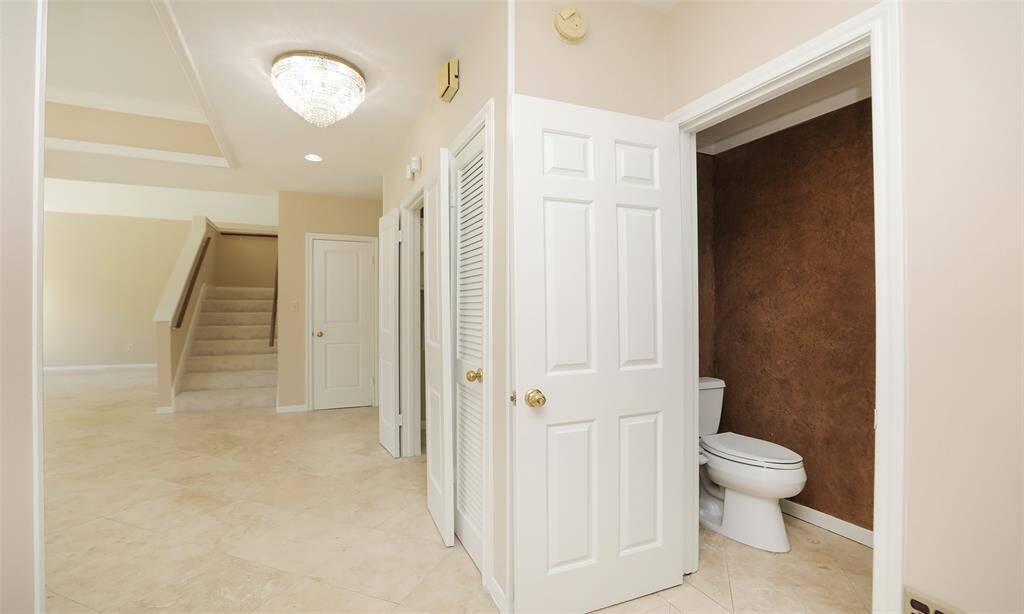 Entry way leading into the home 1/2 bath