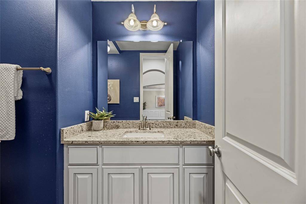 Charming downstairs guest bathroom, designed for both style and convenience, with elegant finishes and a welcoming ambiance.