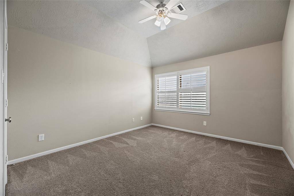 Retire to this charming bedroom and enjoy a quiet, delightful space all your own.
