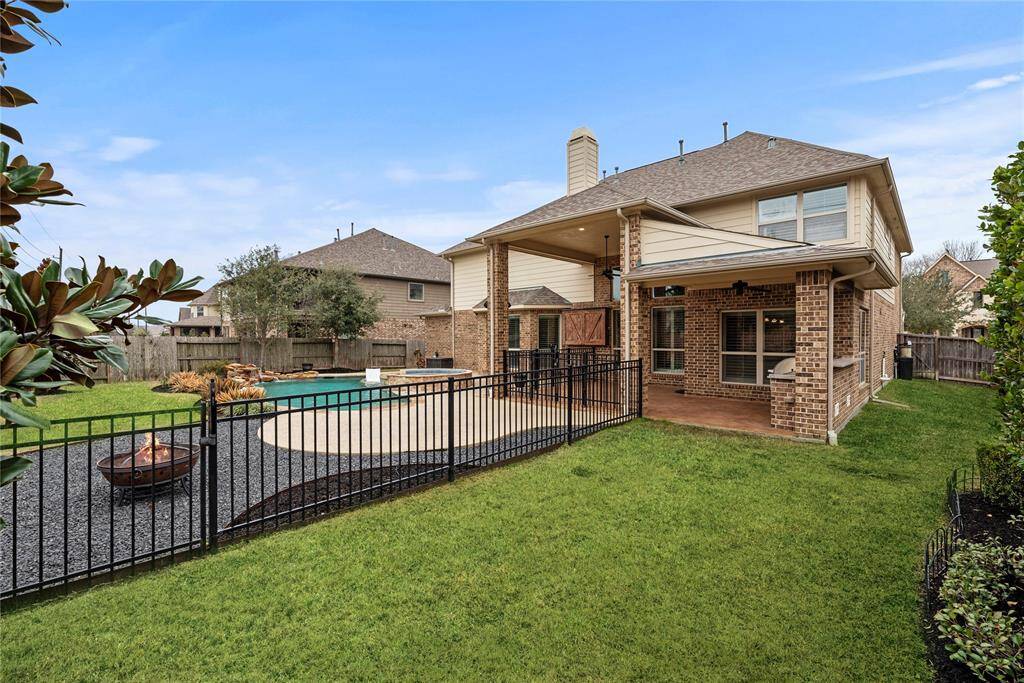 Lazy weekends spent in this backyard will ensure years of delightful memories. Imagine yourself here! Including with the home is a safety fence around the pool area.