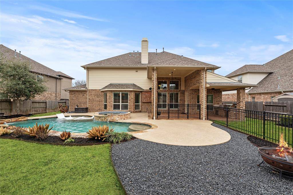 Lovely landscaping and plenty of space for outdoor activities and games.