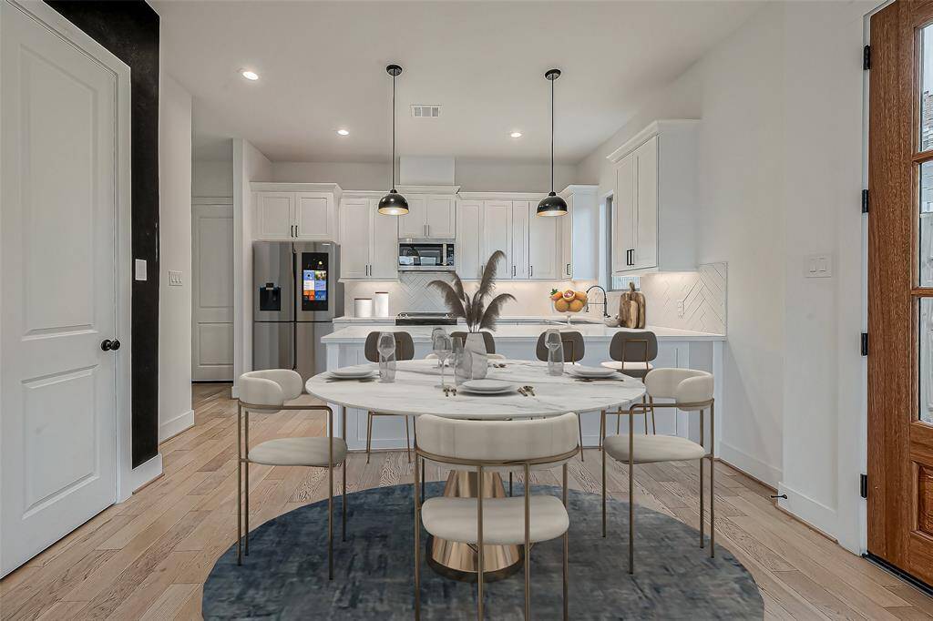 Kitchen is open to the living area. Great for entertaining. Virtually staged.