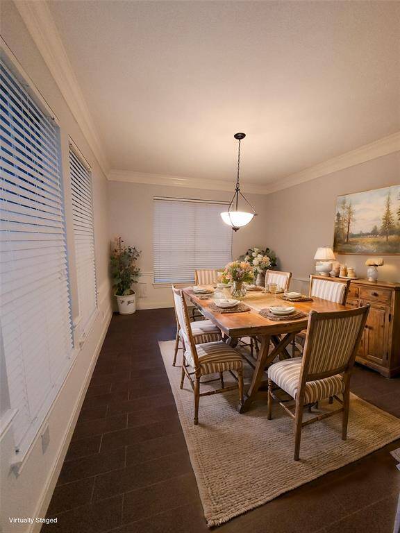 Virtually staged dining room conveniently located adjacent to the kitchen, the dining room is perfectly located for entertaining.