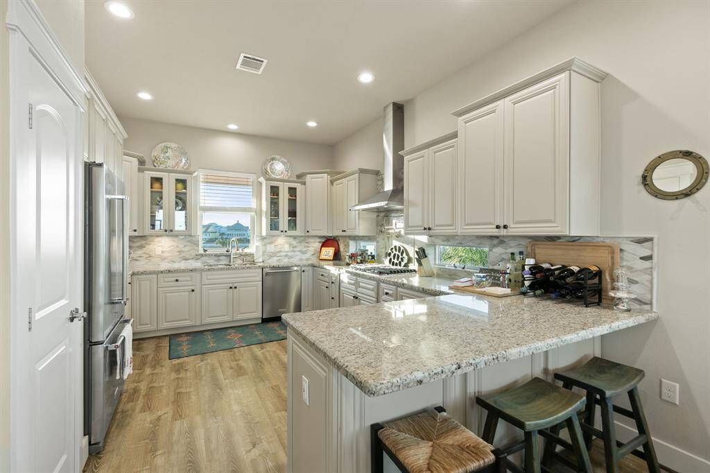 Kitchen offers plenty of storage along with soft closing cabinets & doors.