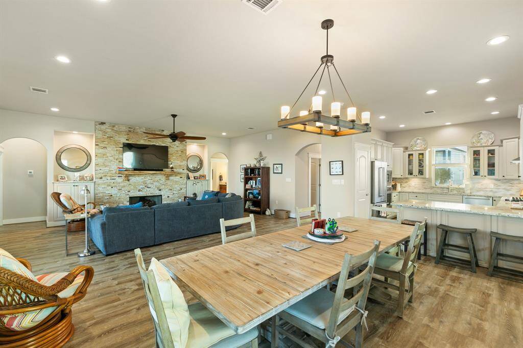 This open concept home comes fully furnished minus some personal items.