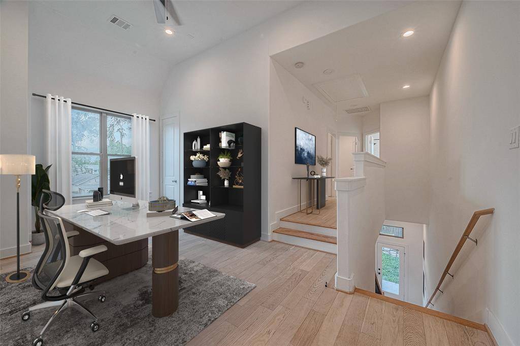 Landing area on the 2nd floor. Make it an office or sitting area. Virtually staged.