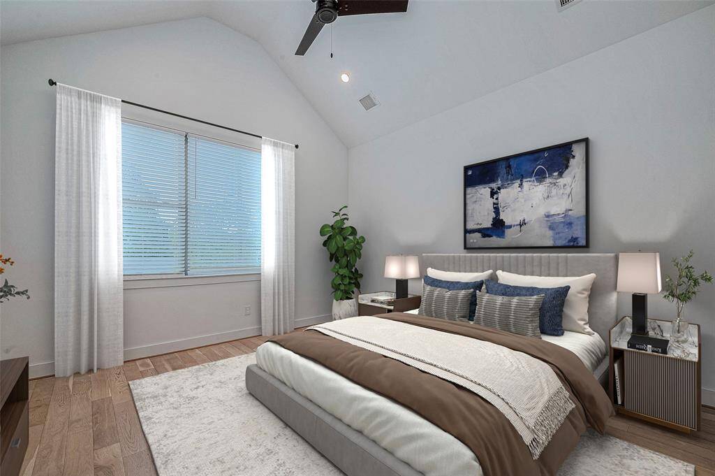 Primary bedroom with gorgeous, vaulted ceilings, 2nd floor. Virtually staged.