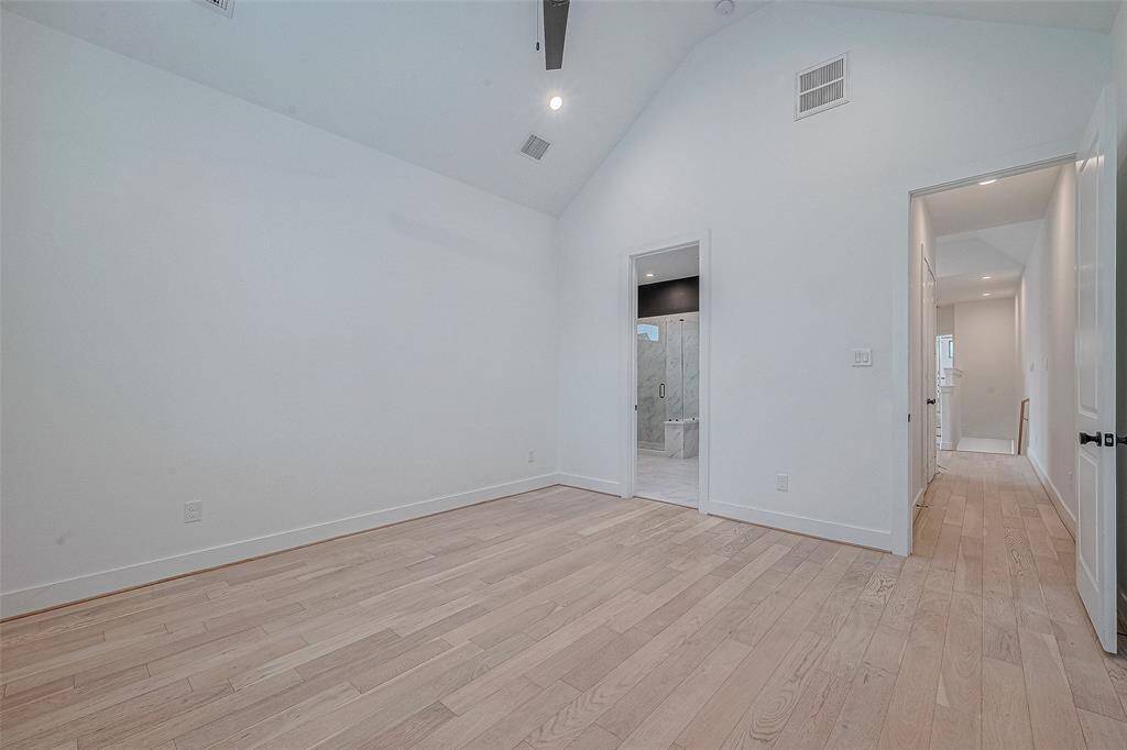 Another view of the primary bedroom.