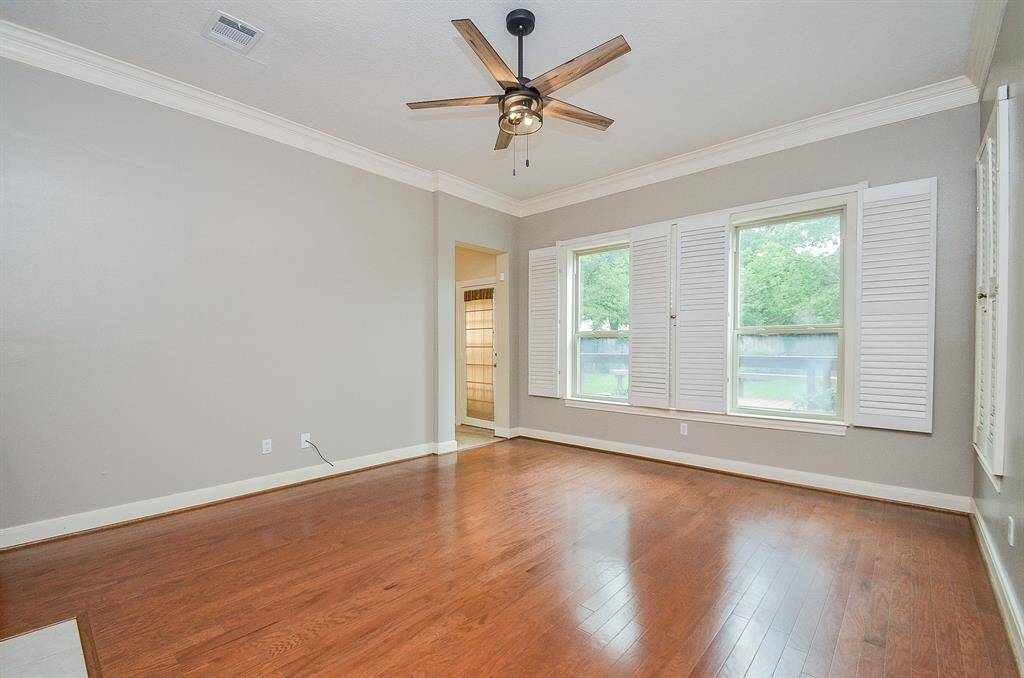 Plantation shutters opened to show the light coming in. Simply beautiful.