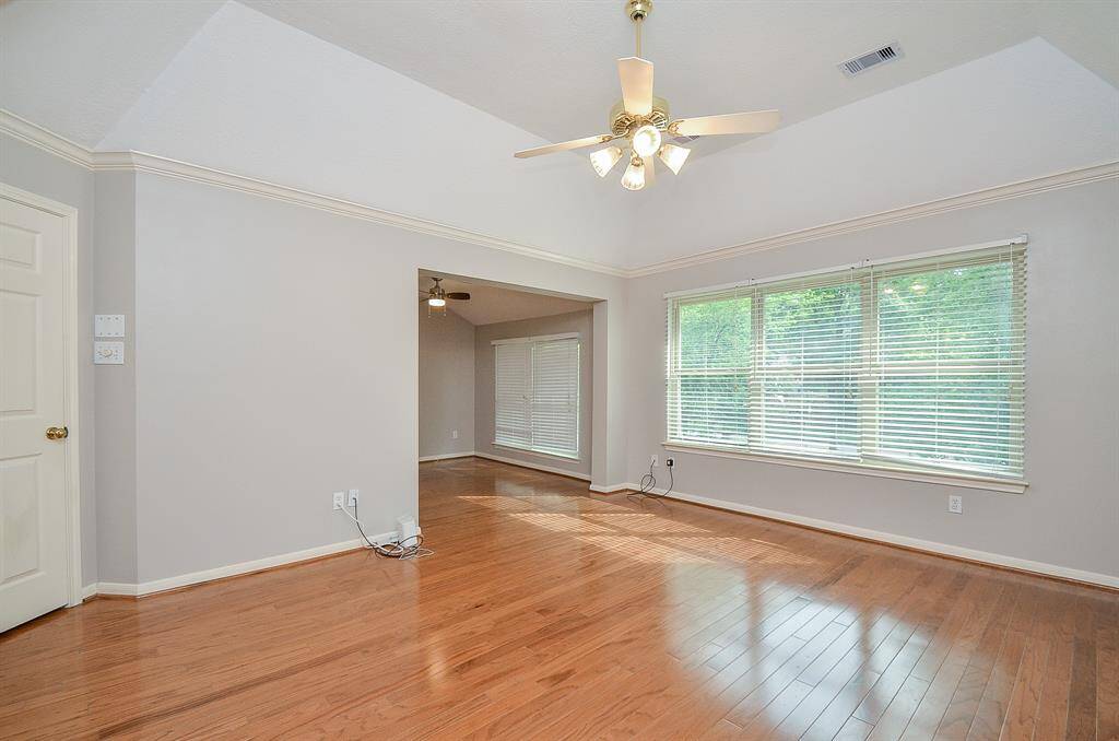 Do you like plenty of space in your primary room? Look no further! This room has 2 spaces the main room and a sitting area with not just one but two walk-in closets!