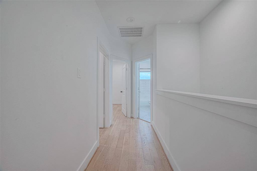 Hallway to the secondary bedrooms at the back of the home, 2nd floor.