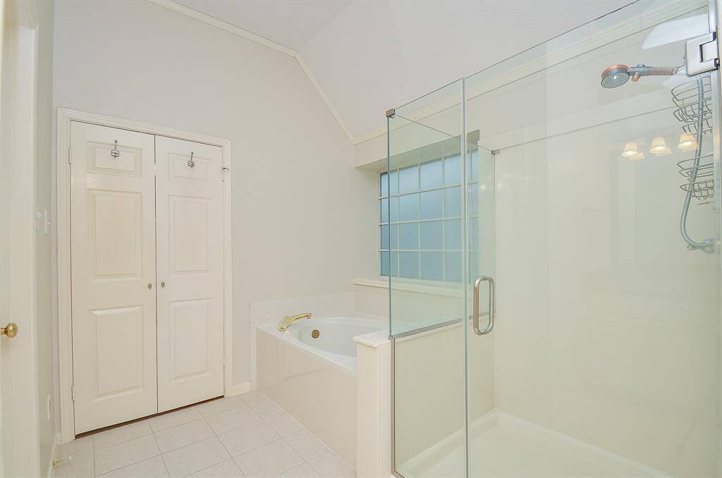 A jetted tub to relax after a long day and a separate shower.