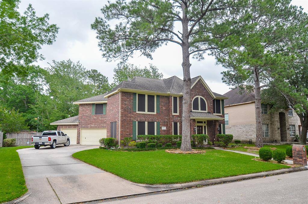 Long driveway and 3 car garage can be yours!