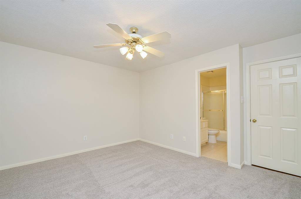 Bedroom 4 is adjacent to the staircase and has a door into another secondary bathroom that also is accessible through the hallway.