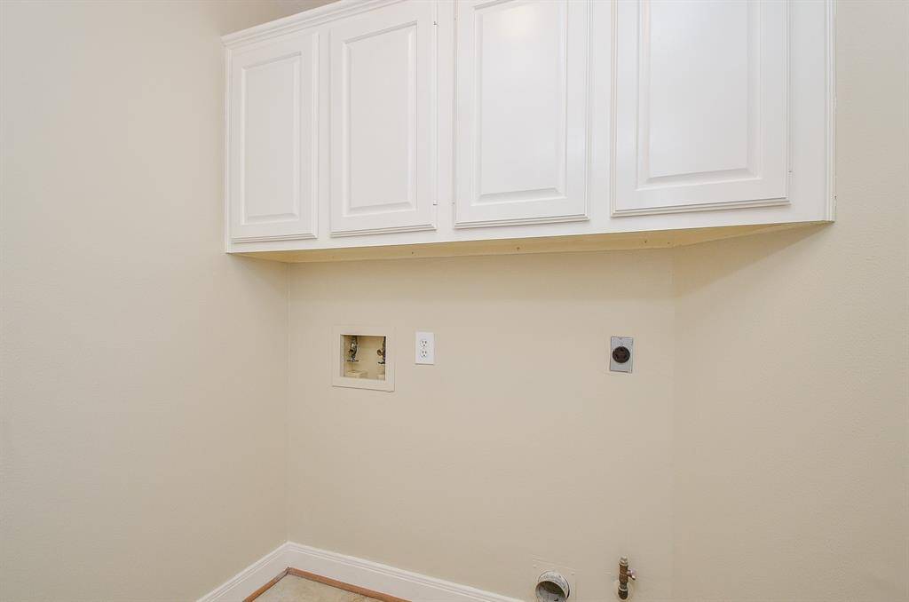 Laundry room is just off the kitchen. It is incorrectly labeled as "pantry" in the floor plan.