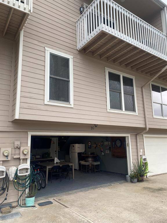 2 car attached garage and fully equipped with a flat panel tv and fridge that stay with the home